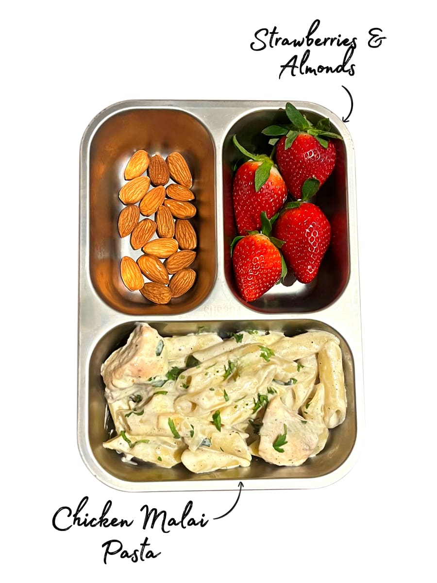 Lunchbox: Chicken malai pasta with strawberries and almonds