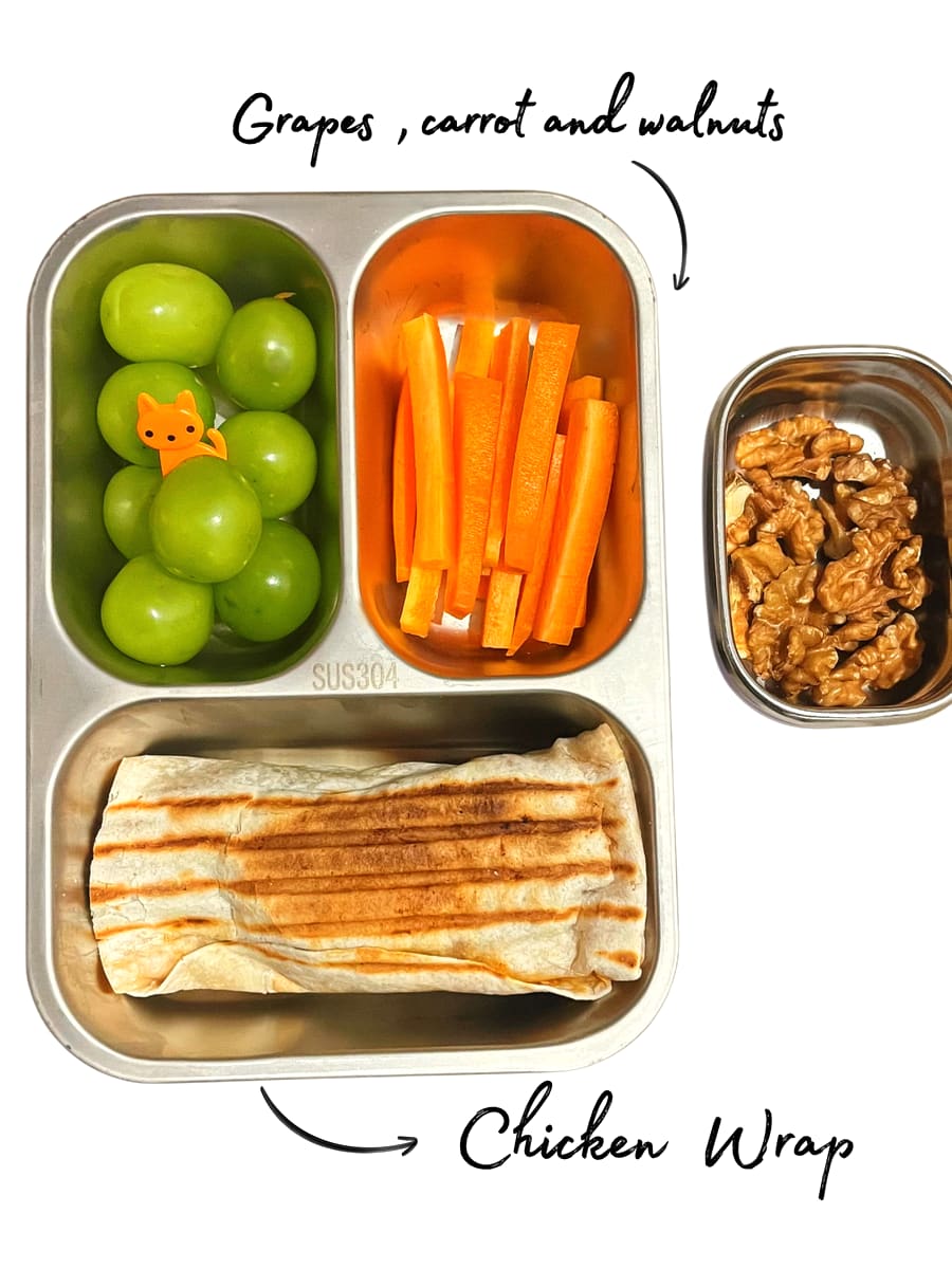 Lunchbox: Chicken wrap with grapes, carrot and walnuts